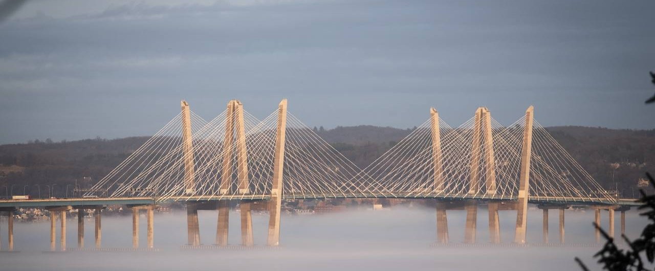 Gov. Mario M. Cuomo Bridge over the Hudson River in morning fog, seen from Piermont